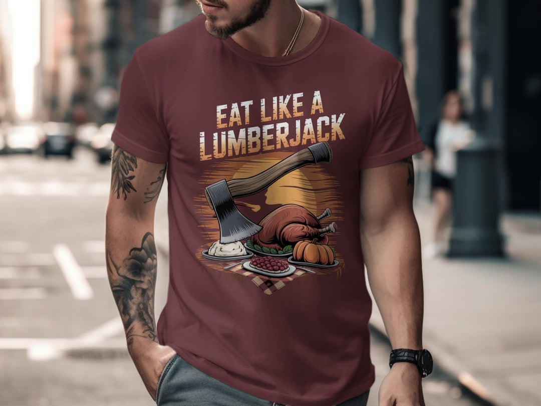 Thanksgiving men’s T-shirt with axe over turkey dinner; “Eat Like a Lumberjack” design
