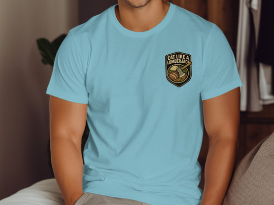Lumberjack Thanksgiving T-shirt with axe and plate badge; “Eat Like a Lumberjack” text