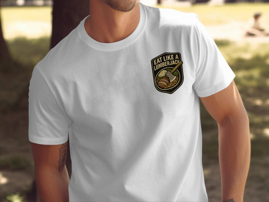 Lumberjack Thanksgiving T-shirt with axe and plate badge; “Eat Like a Lumberjack” text