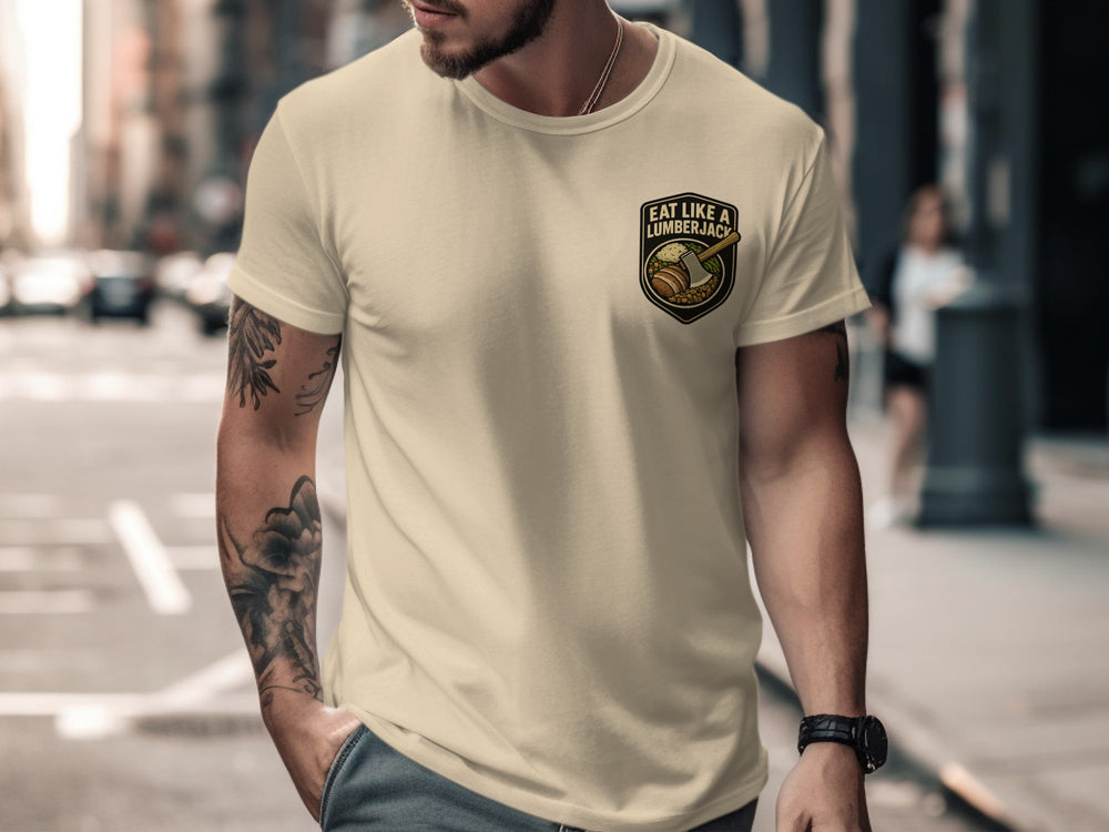 Lumberjack Thanksgiving T-shirt with axe and plate badge; “Eat Like a Lumberjack” text