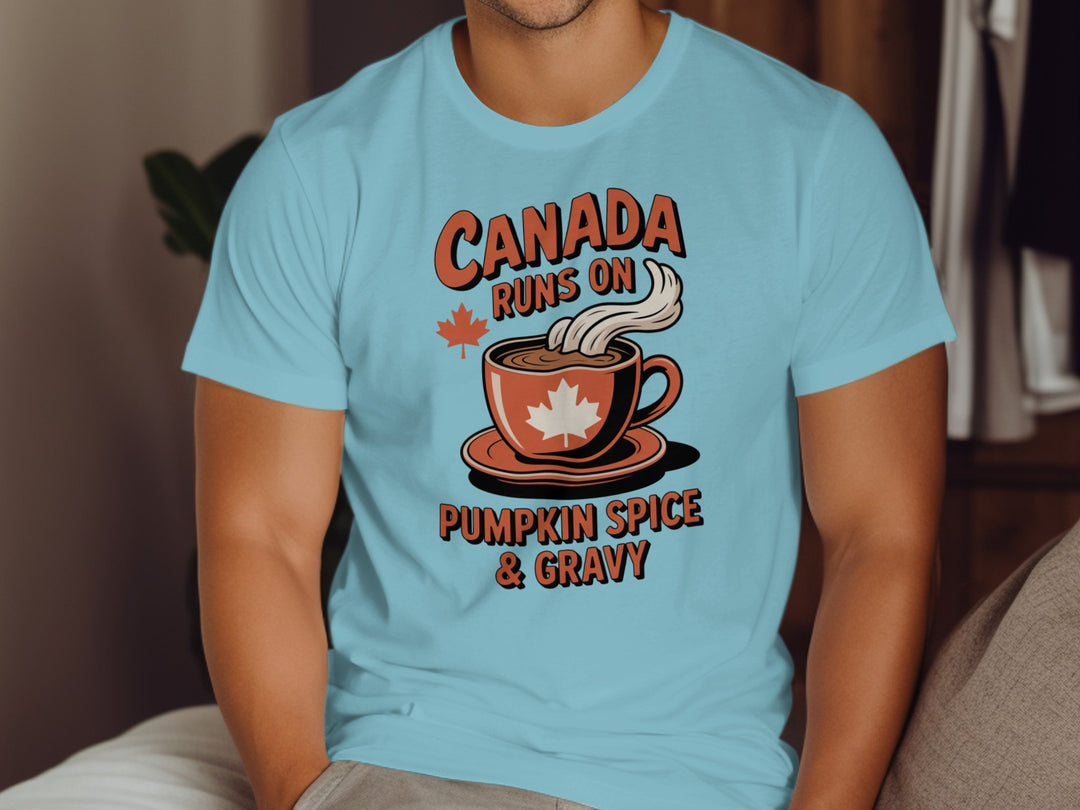 Thanksgiving men’s T-shirt with coffee cup maple leaf graphic and “Canada runs on pumpkin spice & gravy” text