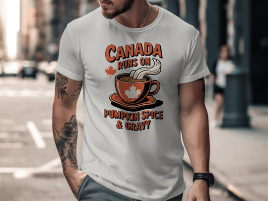 Thanksgiving men’s T-shirt with coffee cup maple leaf graphic and “Canada runs on pumpkin spice & gravy” text