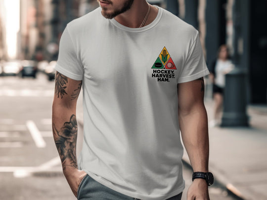Hockey Thanksgiving men’s T-shirt with “Hockey. Harvest. Ham.” triangle corn, puck, and ham design