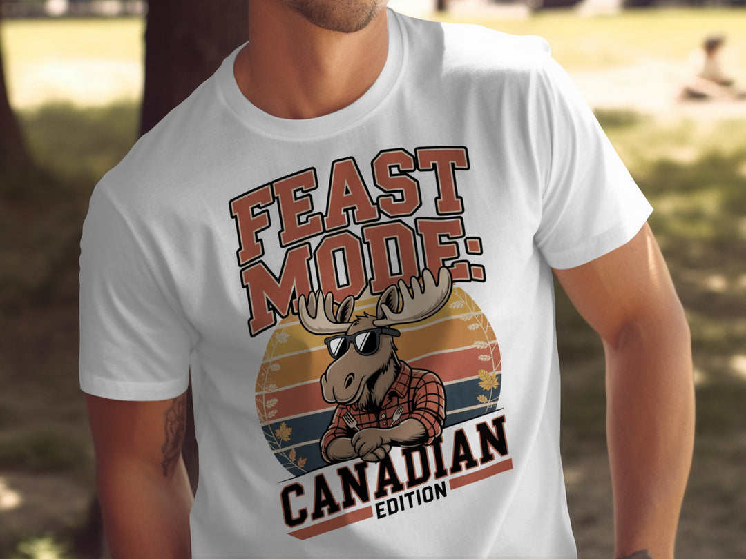 Canadian Thanksgiving T-shirt with flannel moose and “Feast Mode” retro sunset design for men