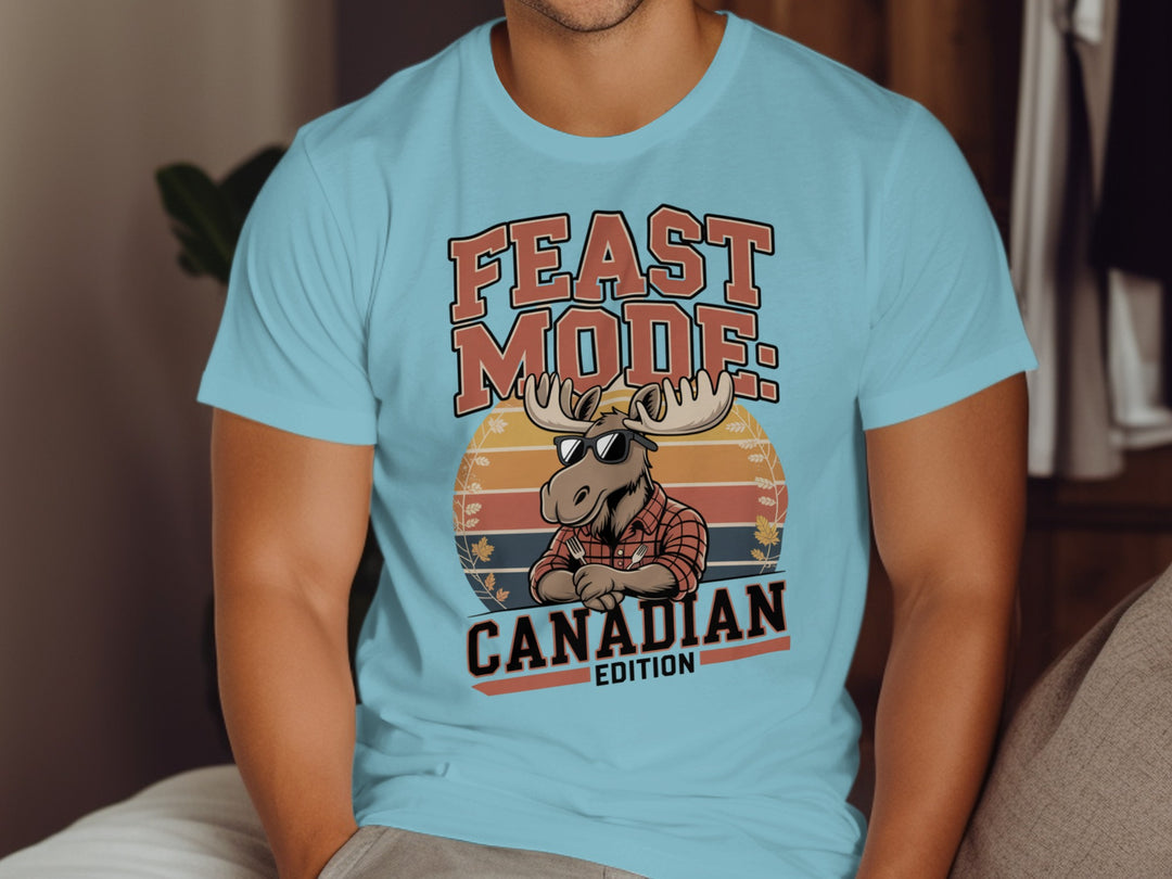 Canadian Thanksgiving T-shirt with flannel moose and “Feast Mode” retro sunset design for men