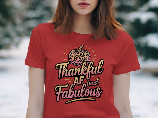 women's thanksgiving t-shirt with “thankful af and fabulous” leopard pumpkin and glitter script