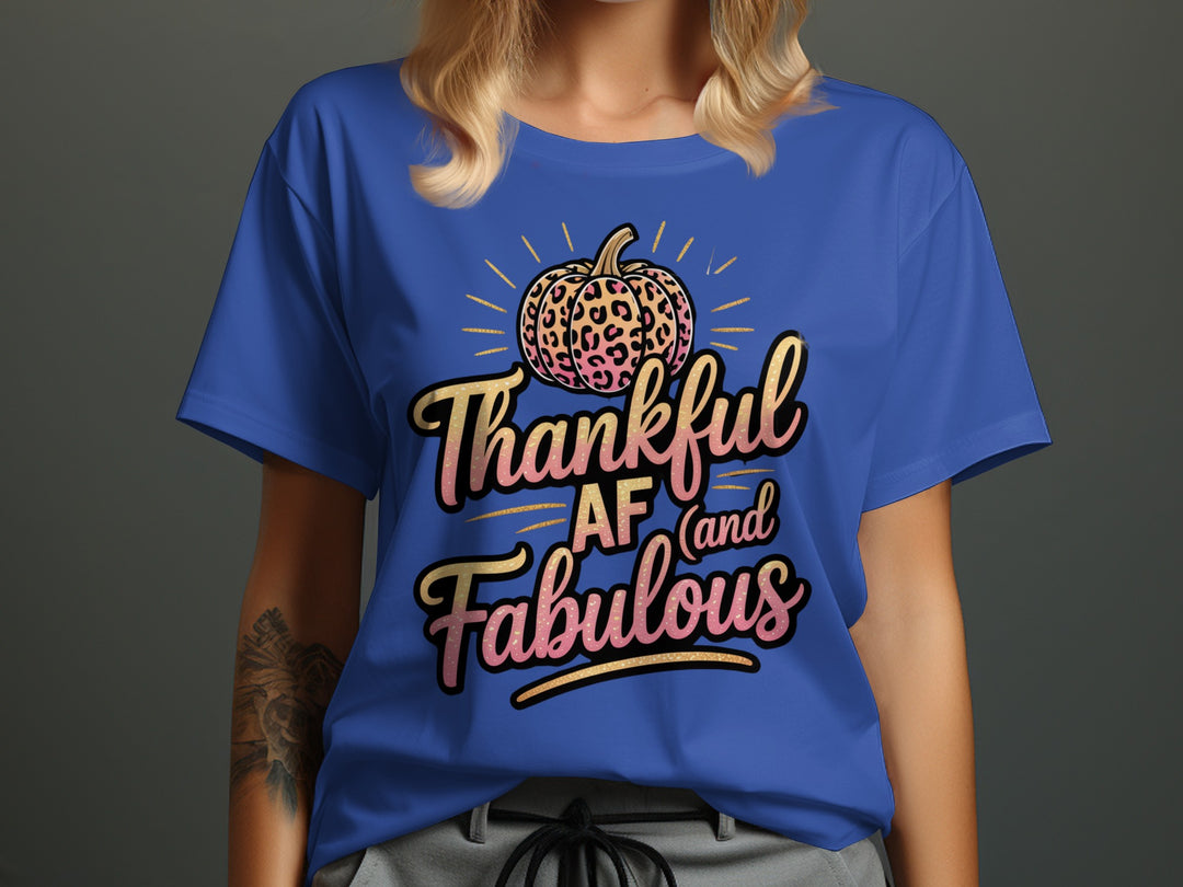 women's thanksgiving t-shirt with “thankful af and fabulous” leopard pumpkin and glitter script