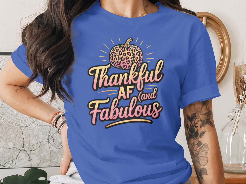 women's thanksgiving t-shirt with “thankful af and fabulous” leopard pumpkin and glitter script