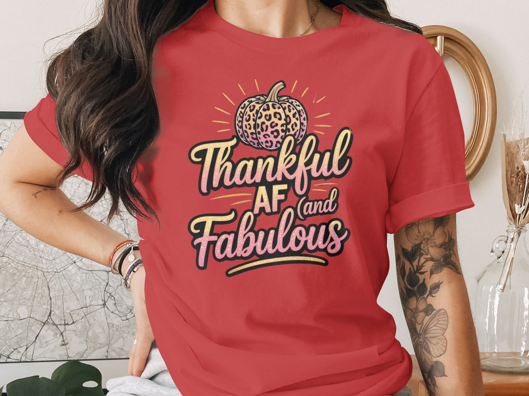 women's thanksgiving t-shirt with “thankful af and fabulous” leopard pumpkin and glitter script