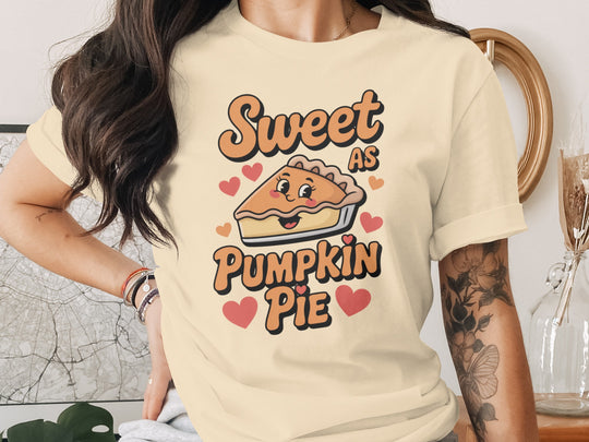 women's thanksgiving t-shirt with “sweet as pumpkin pie” smiling pie slice and hearts graphic