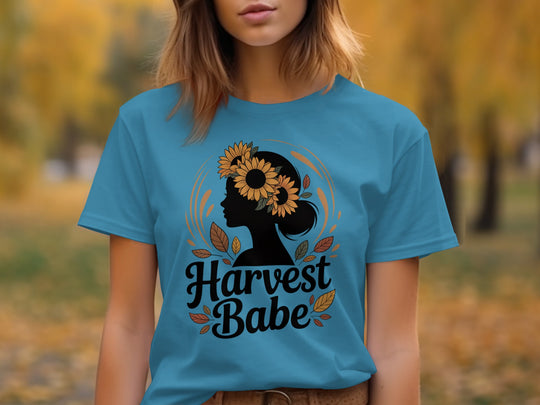 women's thanksgiving t-shirt with “harvest babe” silhouette and sunflower crown graphic