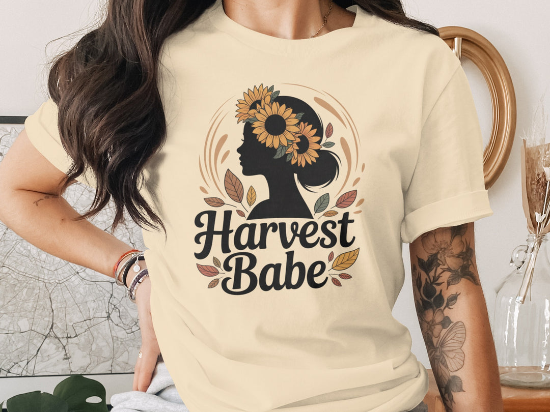 women's thanksgiving t-shirt with “harvest babe” silhouette and sunflower crown graphic