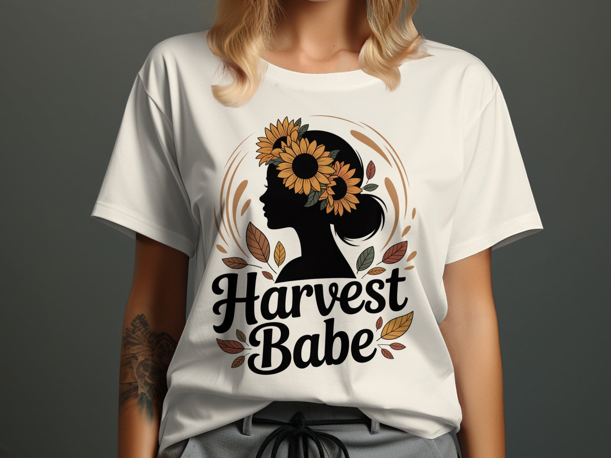 women's thanksgiving t-shirt with “harvest babe” silhouette and sunflower crown graphic
