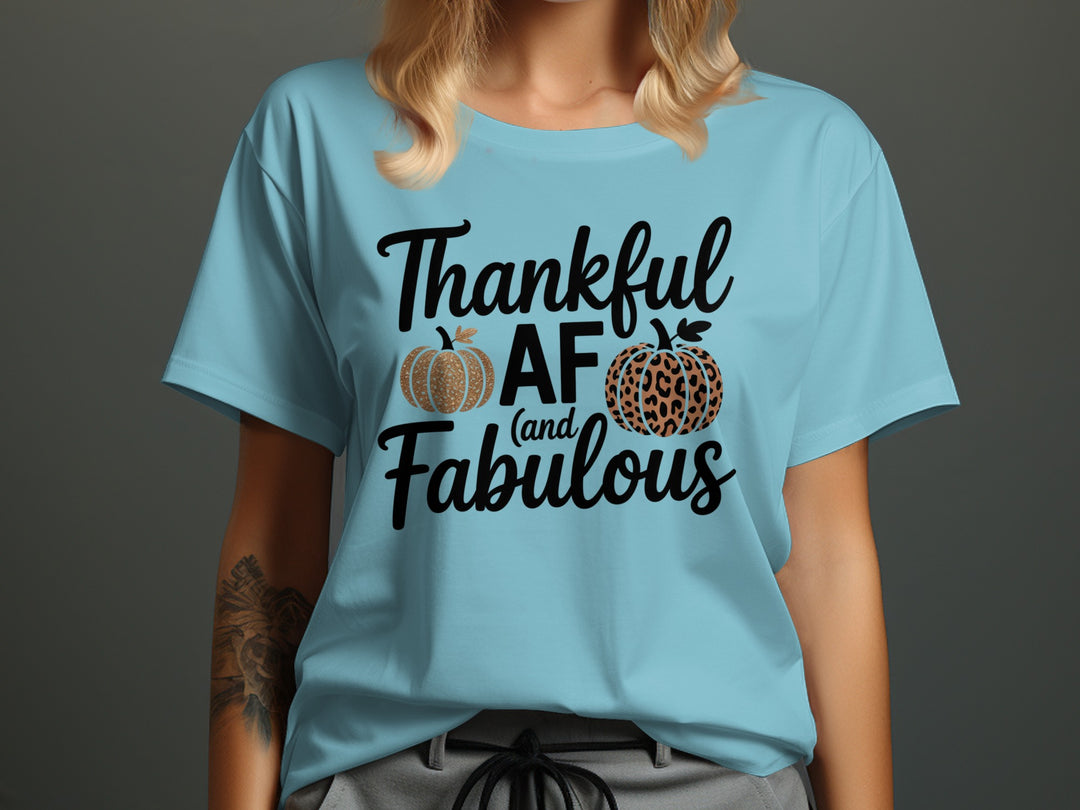 women's thanksgiving t-shirt with “thankful af and fabulous” leopard & glitter pumpkins graphic