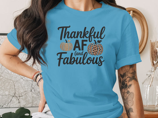 women's thanksgiving t-shirt with “thankful af and fabulous” leopard & glitter pumpkins graphic