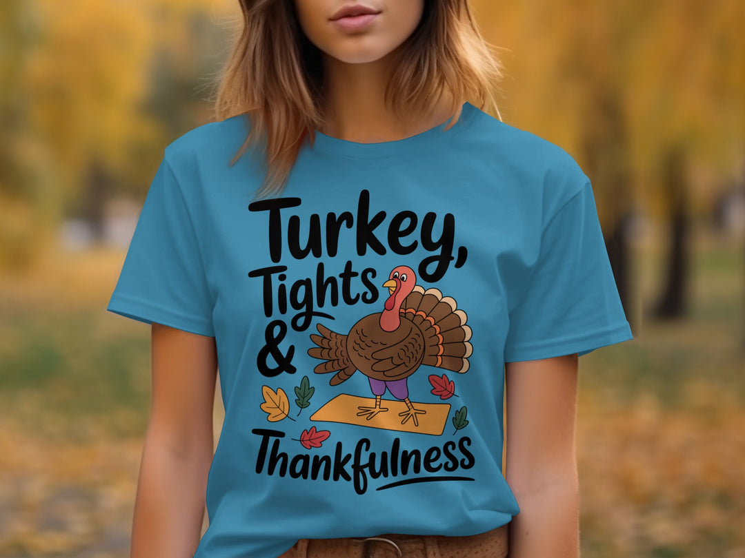 women's thanksgiving t-shirt with “turkey, tights & thankfulness” yoga turkey on mat graphic