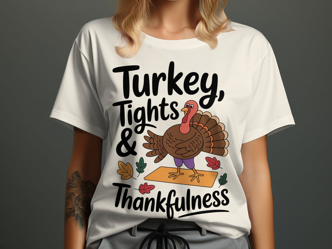 women's thanksgiving t-shirt with “turkey, tights & thankfulness” yoga turkey on mat graphic