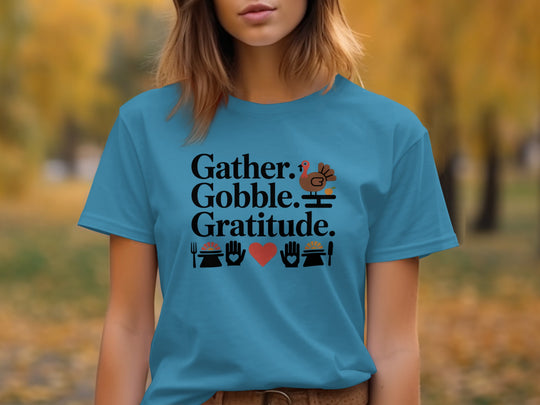 women’s thanksgiving t-shirt with “gather gobble gratitude” turkey and pies graphic