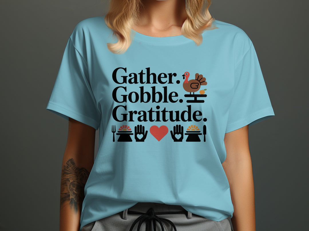 women’s thanksgiving t-shirt with “gather gobble gratitude” turkey and pies graphic