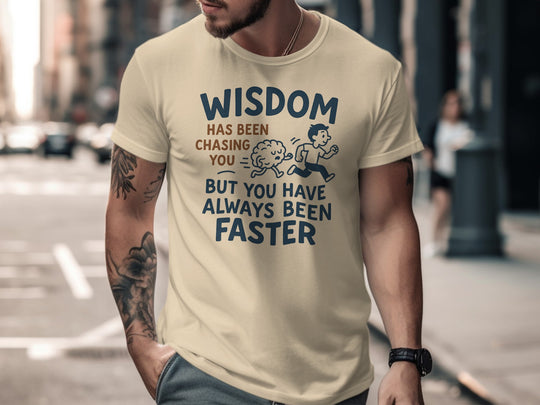 funny men's t-shirt with brain chasing runner and “wisdom has been chasing you” quote