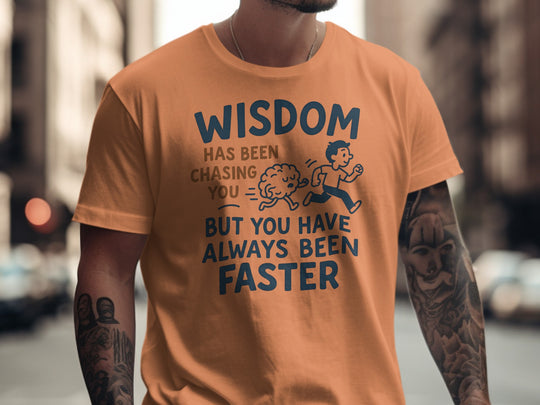 funny men's t-shirt with brain chasing runner and “wisdom has been chasing you” quote