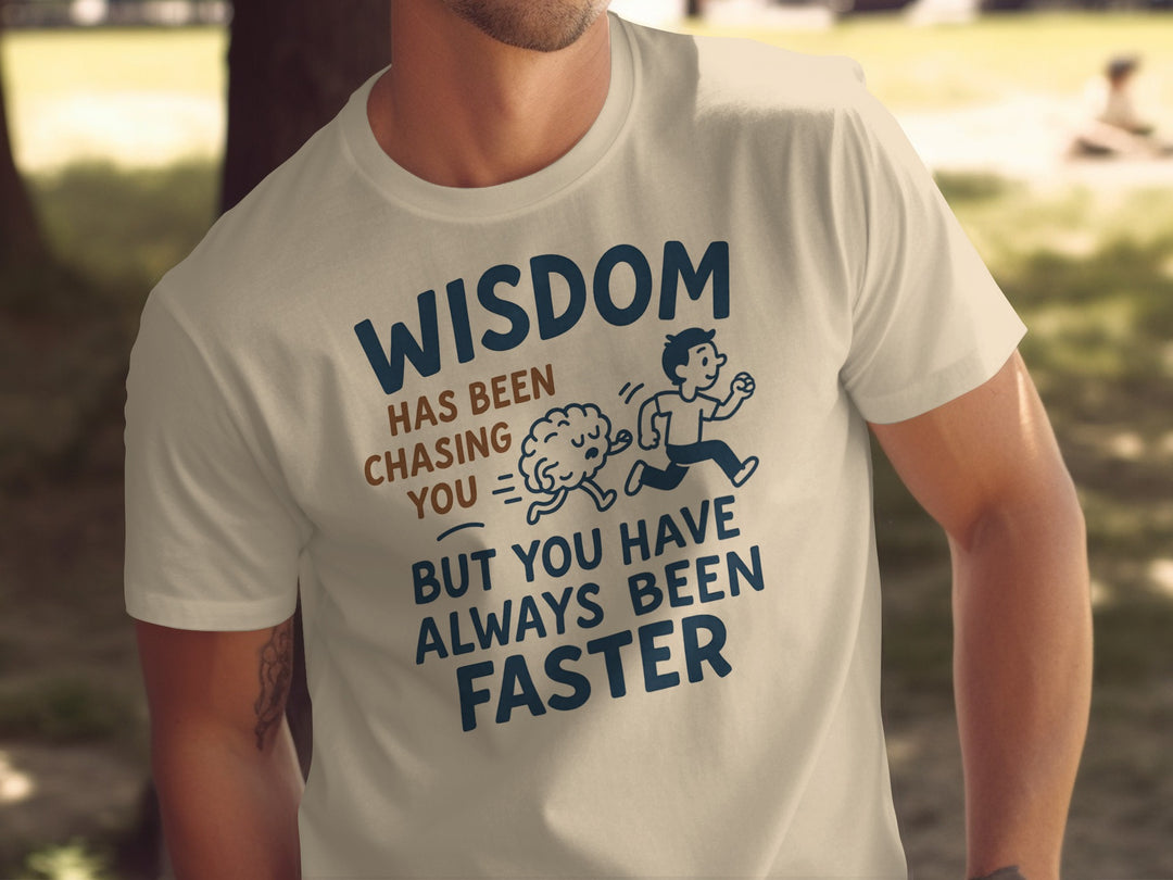 funny men's t-shirt with brain chasing runner and “wisdom has been chasing you” quote