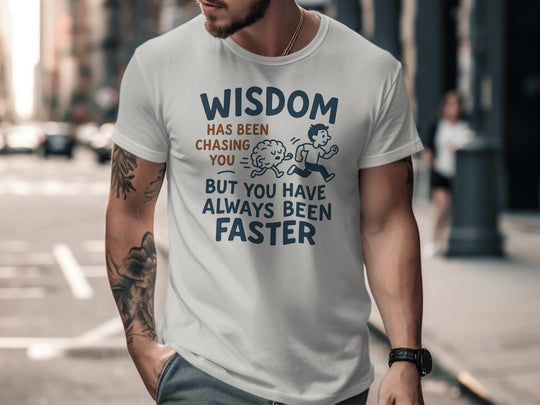 funny men's t-shirt with brain chasing runner and “wisdom has been chasing you” quote