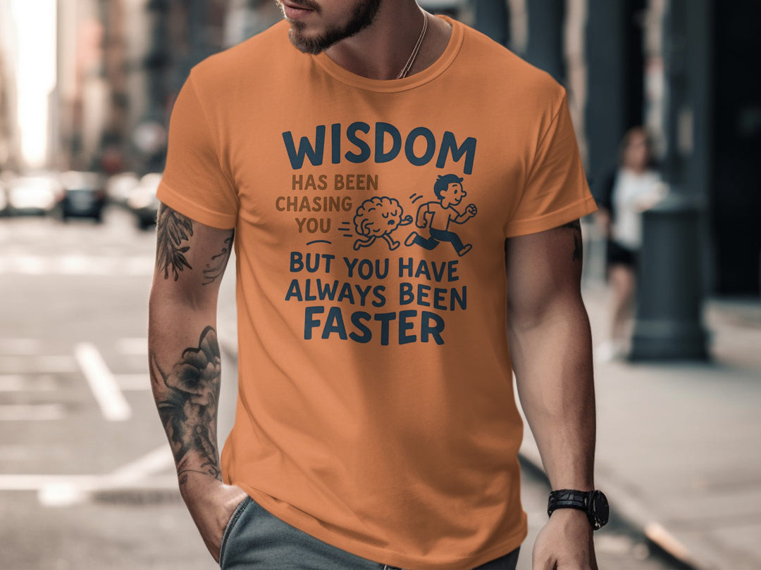 funny men's t-shirt with brain chasing runner and “wisdom has been chasing you” quote
