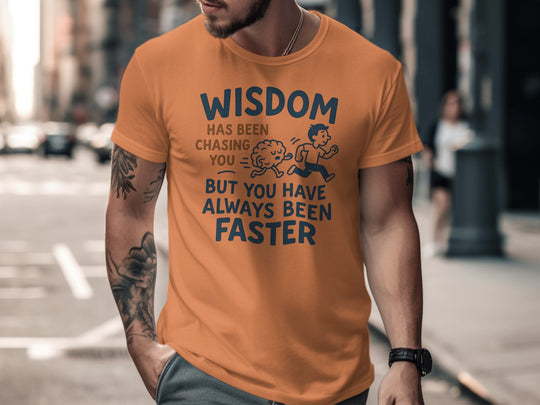 funny men's t-shirt with brain chasing runner and “wisdom has been chasing you” quote
