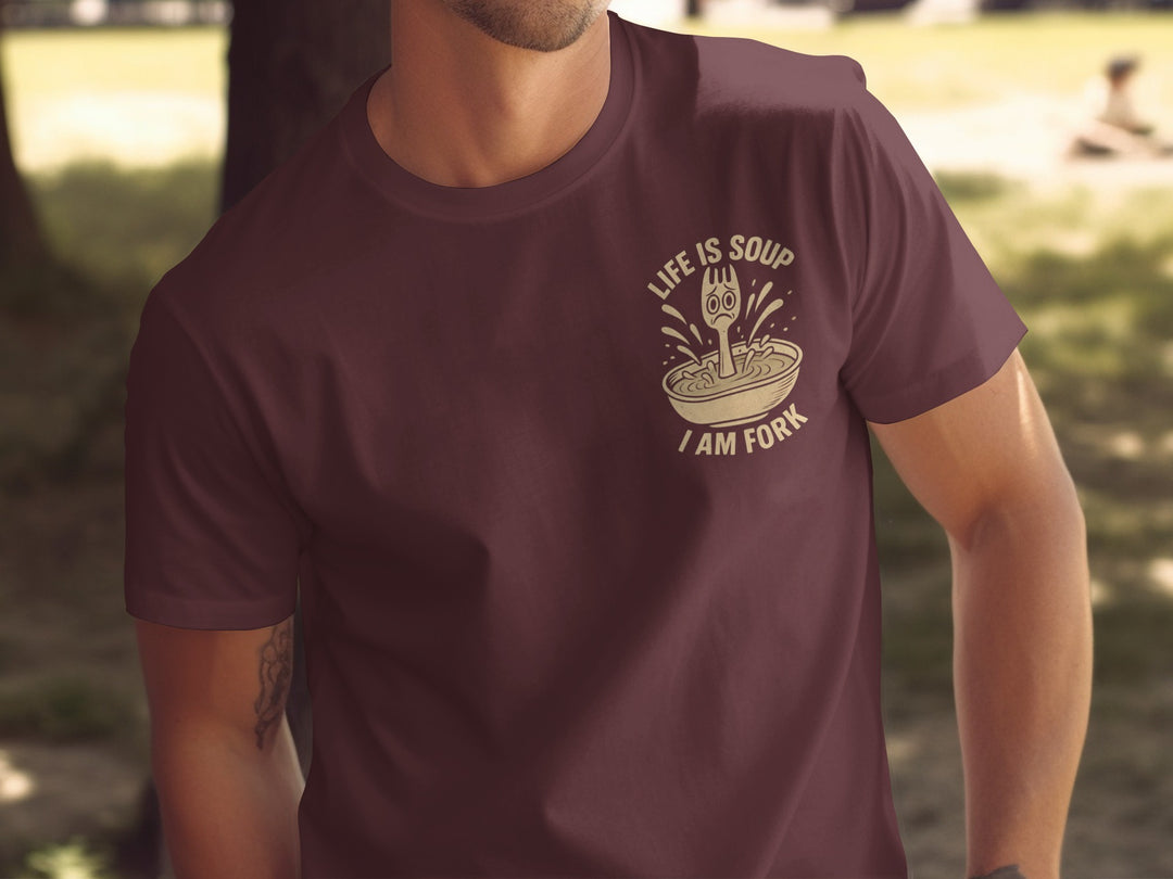 funny men's t-shirt with “life is soup i am fork” quote and sad fork in soup bowl graphic