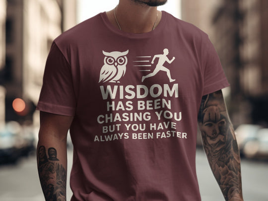 funny men's t-shirt with owl, runner, and “wisdom has been chasing you” quote