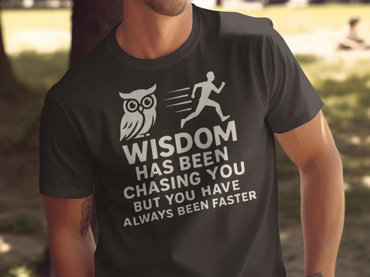 funny men's t-shirt with owl, runner, and “wisdom has been chasing you” quote