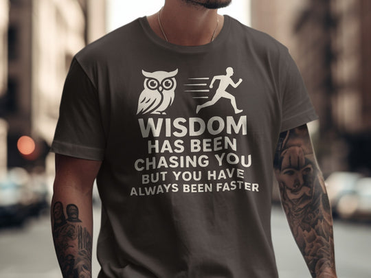 funny men's t-shirt with owl, runner, and “wisdom has been chasing you” quote