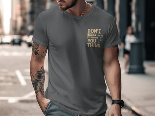 funny men's t-shirt with “don't believe everything you think” quote and spiral head graphic