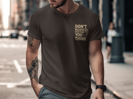 funny men's t-shirt with “don't believe everything you think” quote and spiral head graphic