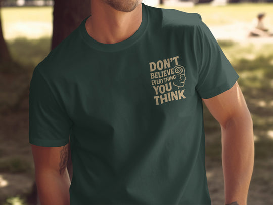 funny men's t-shirt with “don't believe everything you think” quote and spiral head graphic