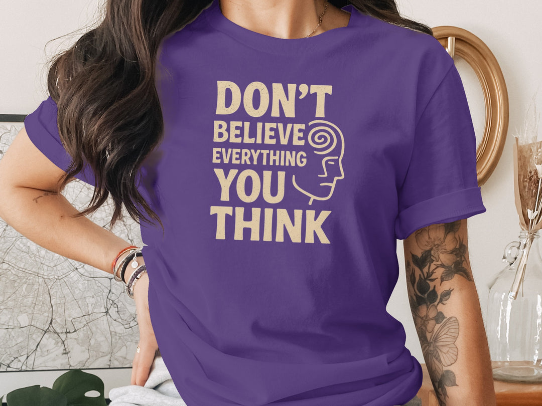 don't believe everything you think t-shirt, sand print quote, women’s graphic tee