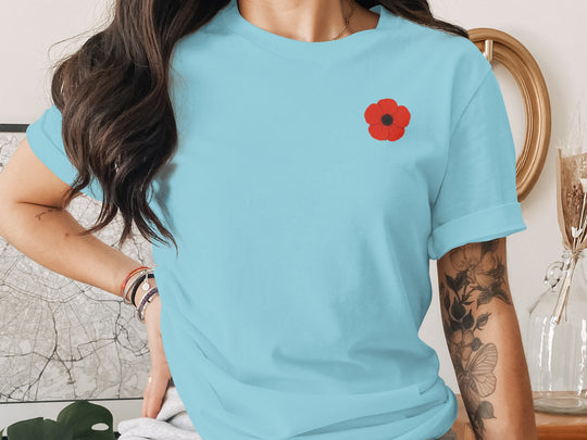 women’s remembrance day t-shirt with single red poppy graphic