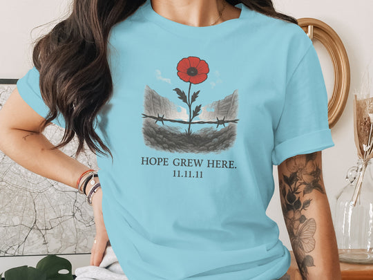 women’s remembrance day t-shirt with poppy rising from trenches — hope grew here