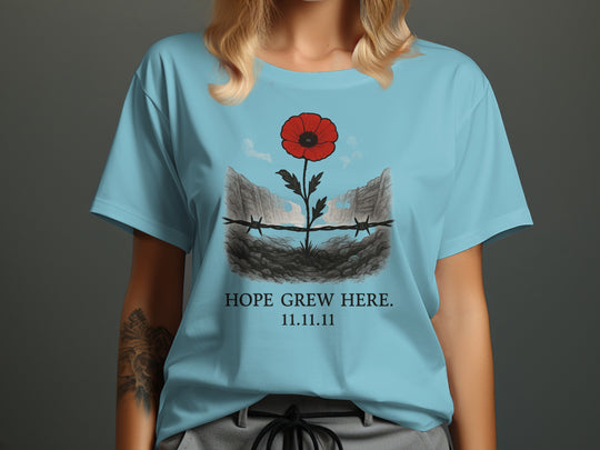 women’s remembrance day t-shirt with poppy rising from trenches — hope grew here