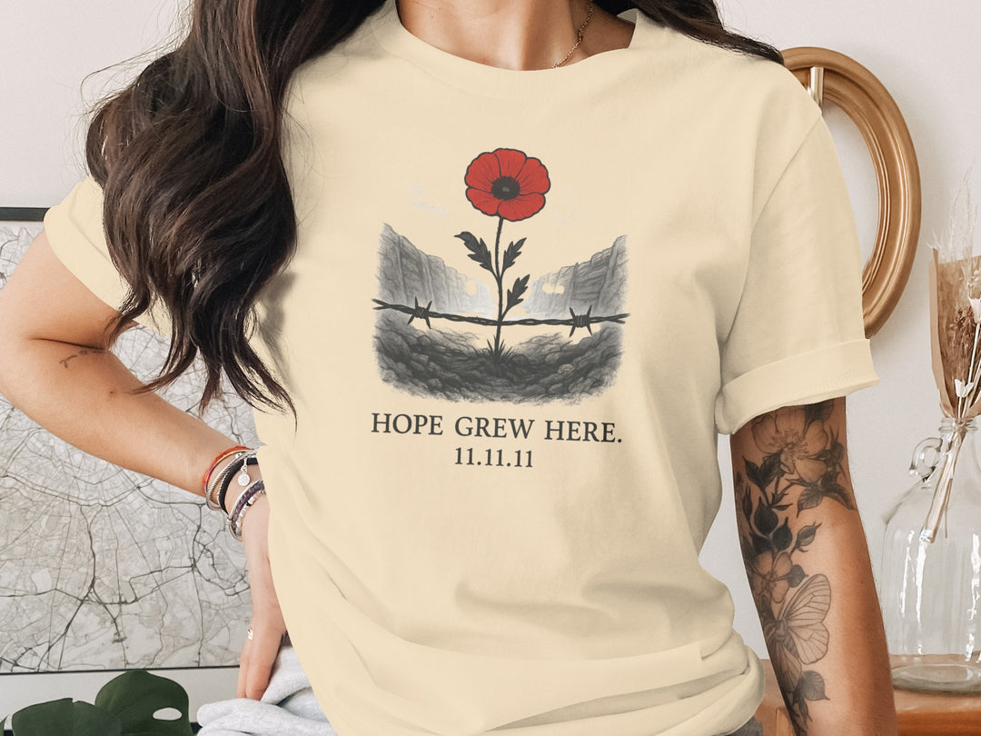 women’s remembrance day t-shirt with poppy rising from trenches — hope grew here