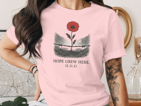 women’s remembrance day t-shirt with poppy rising from trenches — hope grew here