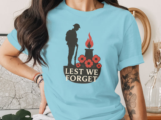 remembrance day women’s t-shirt with soldier, eternal flame and poppies — lest we forget
