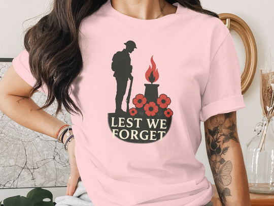 remembrance day women’s t-shirt with soldier, eternal flame and poppies — lest we forget