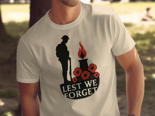 remembrance day men’s t-shirt with soldier, eternal flame and poppies — lest we forget