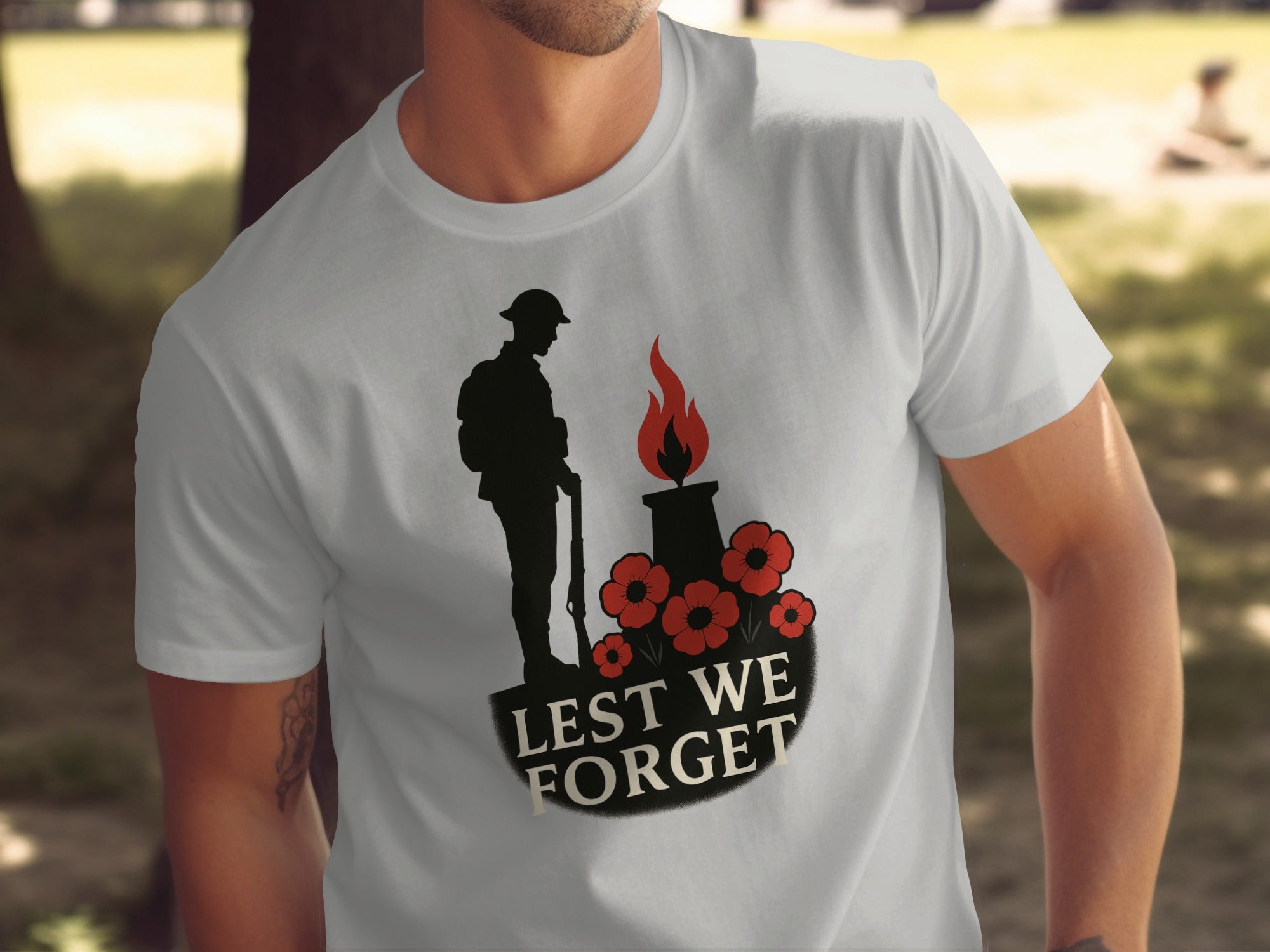 remembrance day men’s t-shirt with soldier, eternal flame and poppies — lest we forget