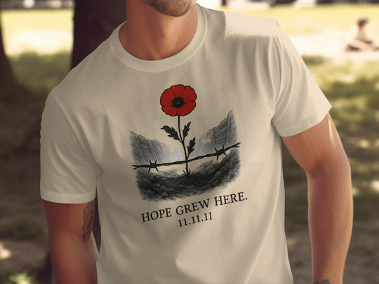 poppy growing through barbed wire trench — men’s remembrance day t-shirt