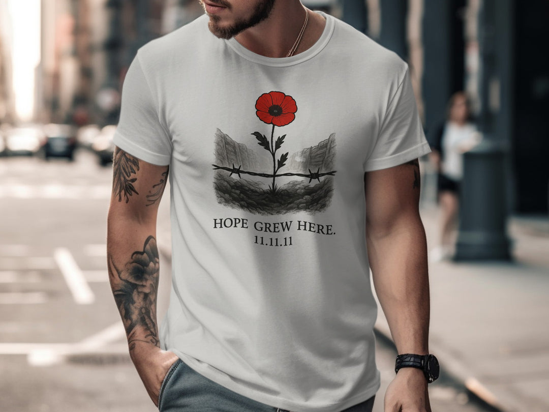 poppy growing through barbed wire trench — men’s remembrance day t-shirt