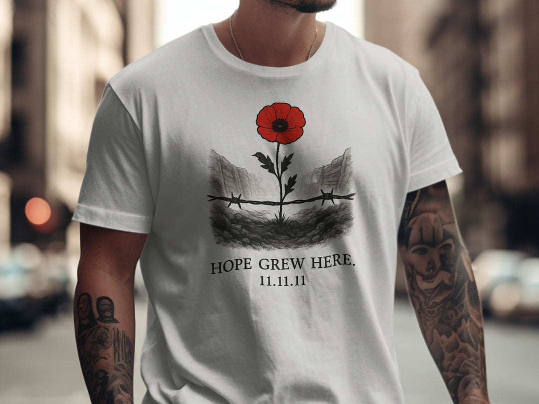 poppy growing through barbed wire trench — men’s remembrance day t-shirt