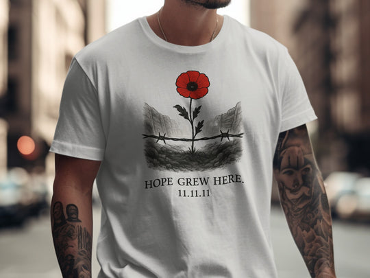 poppy growing through barbed wire trench — men’s remembrance day t-shirt